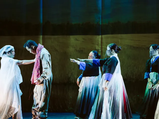 A spirit guide leads Lee Lue toward the ancestors, who reach out to receive him.